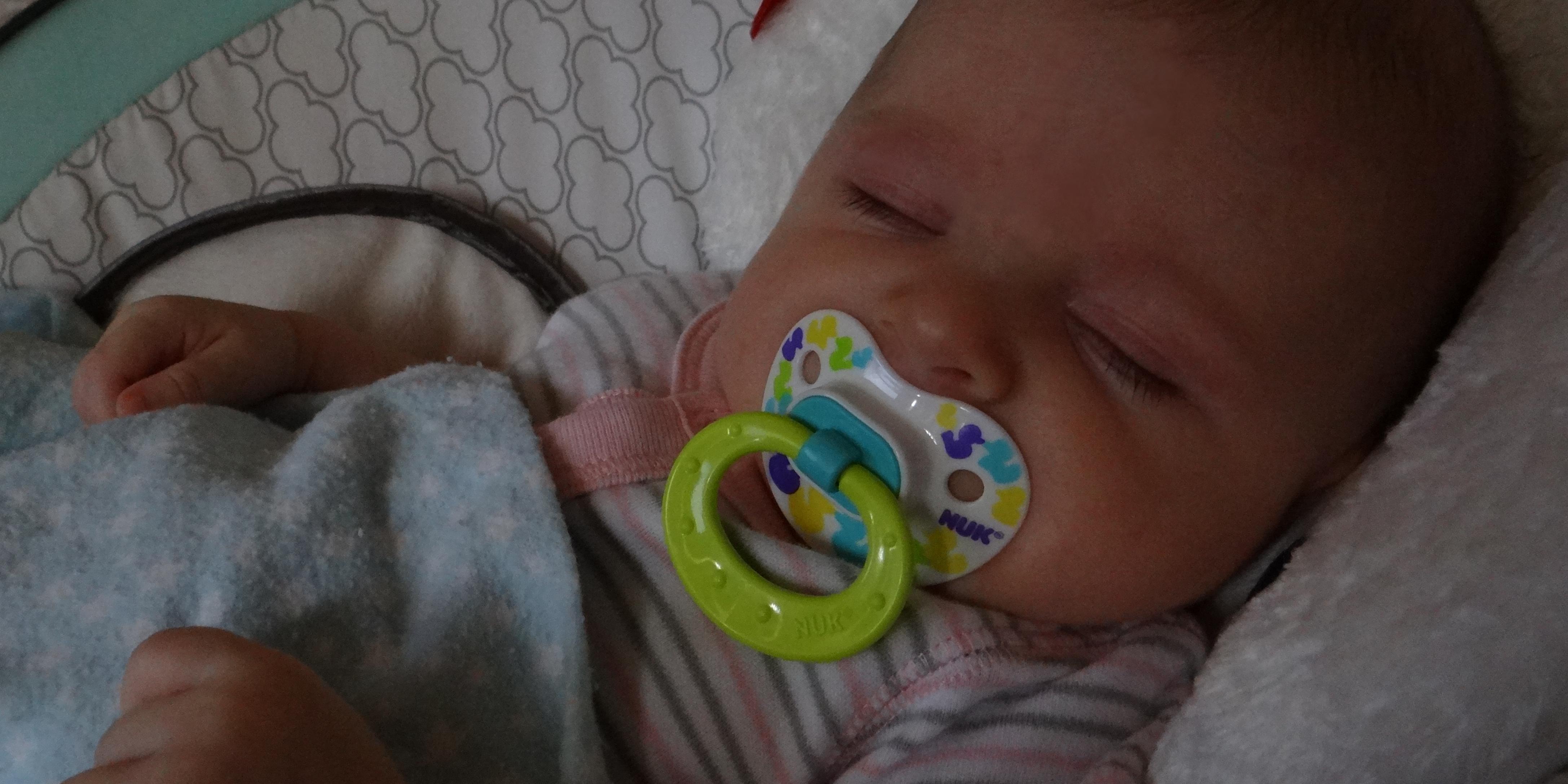 Baby with NUK pacifier