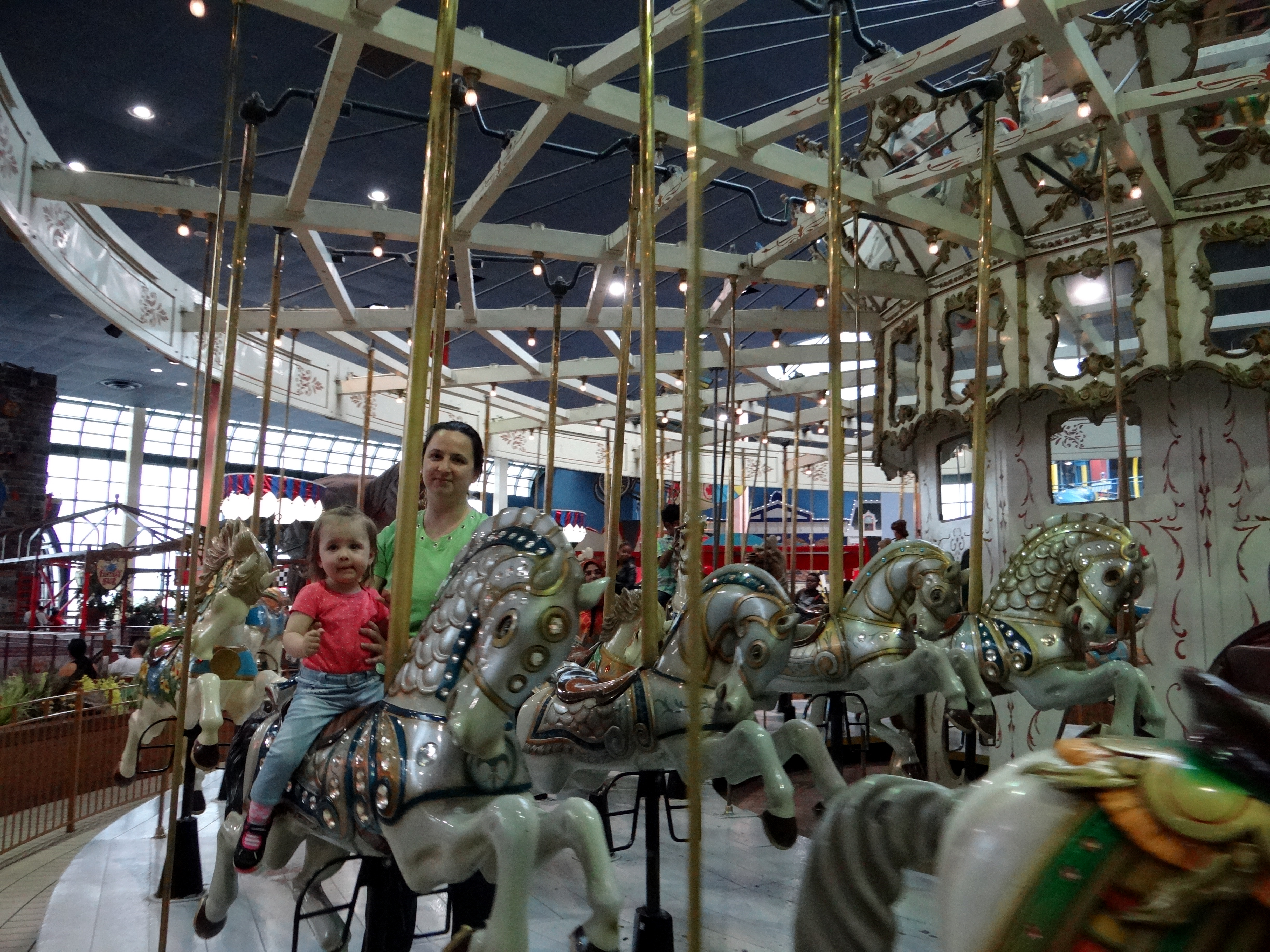 Toddler on a carousel horse at the Fantasy Fair