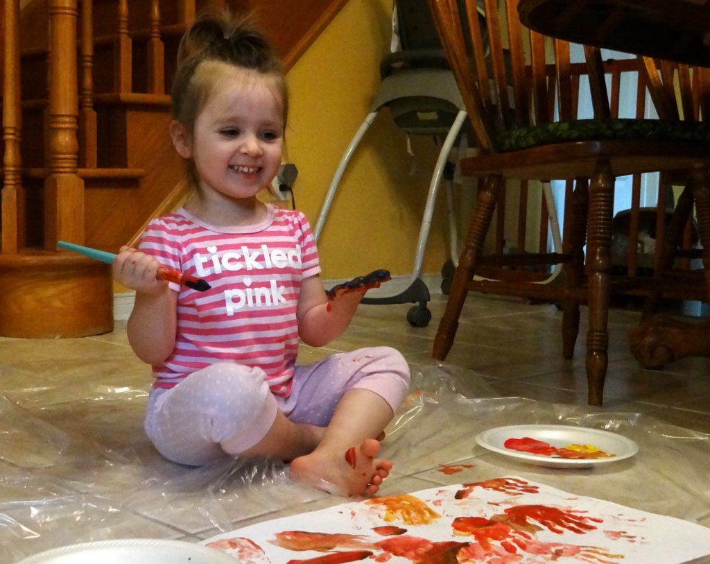 Toddler Peachy finger painting